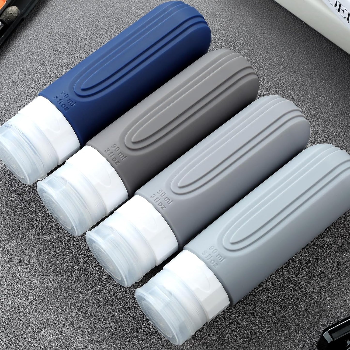 Travel Bottles for Toiletries, Tsa Approved 3oz Travel Size Containers BPA Free Leak Proof Refillable Liquid Silicone Squeezable Travel Accessories for Shampoo Conditioner Lotion (4 Pack)…